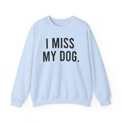 "I MISS MY DOG." dog lover sweatshirt with black text on light blue unisex crewneck
