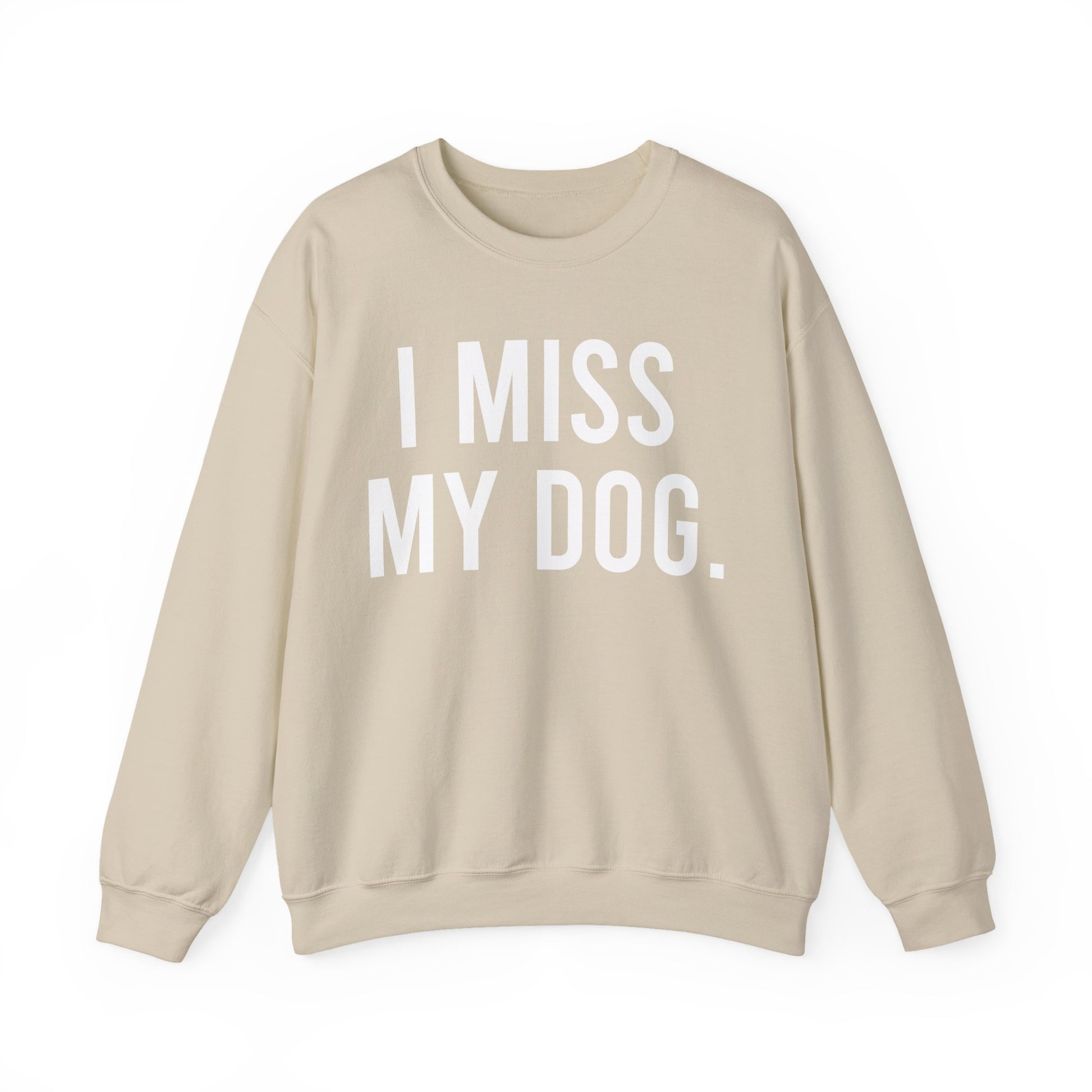 "I MISS MY DOG." dog lover sweatshirt with white text on beige sand unisex crewneck
