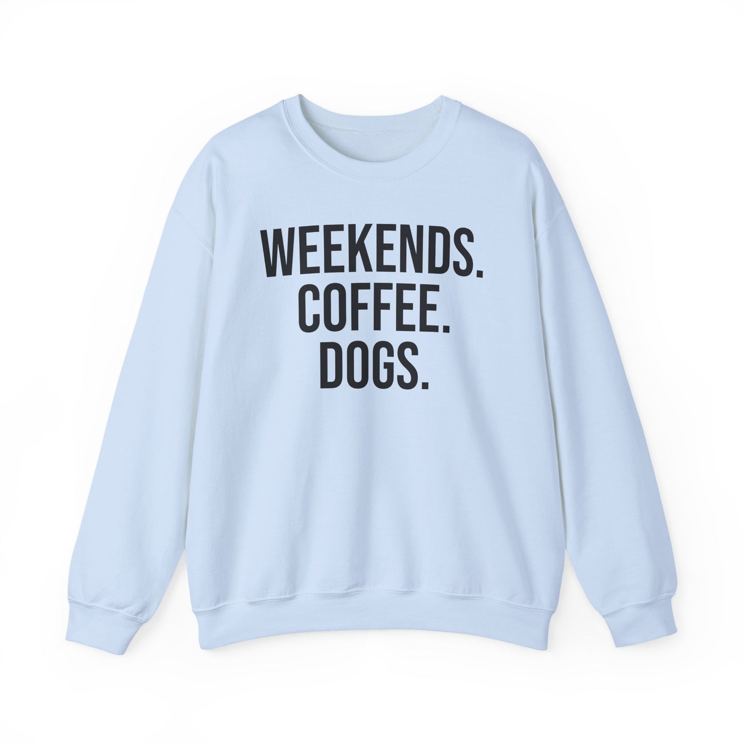 Light blue sweatshirt with 'WEEKENDS. COFFEE. DOGS.' black text on a white background.