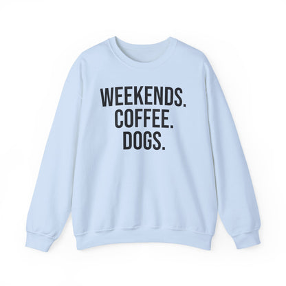 Light blue sweatshirt with 'WEEKENDS. COFFEE. DOGS.' black text on a white background.