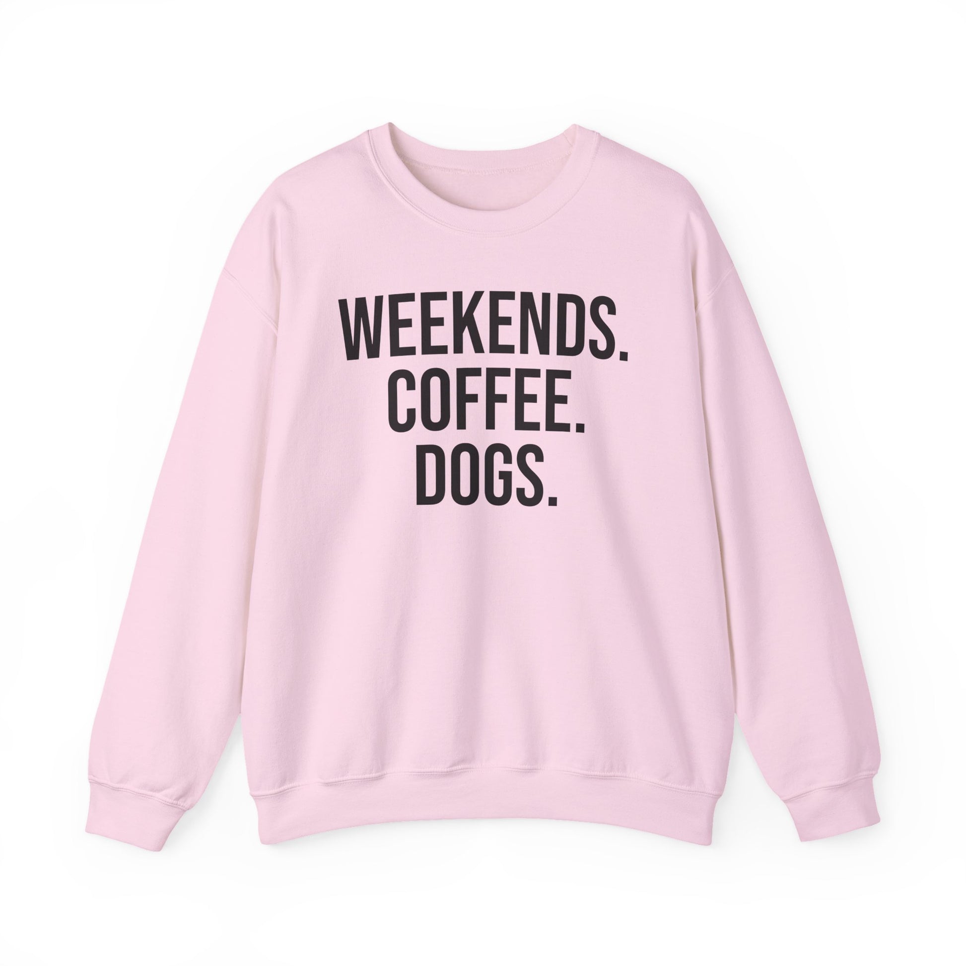 Light pink sweatshirt with 'WEEKENDS. COFFEE. DOGS.' black text on a white background.