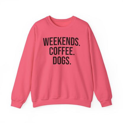 Safety pink sweatshirt with 'WEEKENDS. COFFEE. DOGS.' black text on a white background.