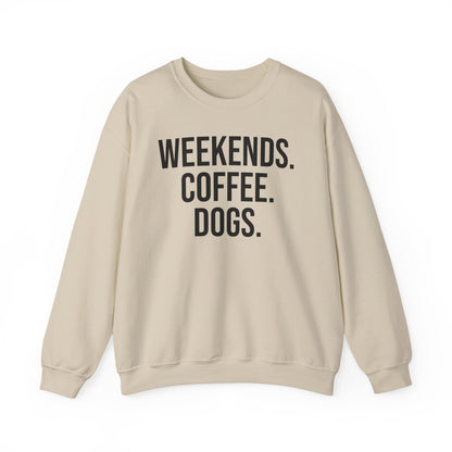 Sand beige sweatshirt with 'WEEKENDS. COFFEE. DOGS.' black text on a white background.