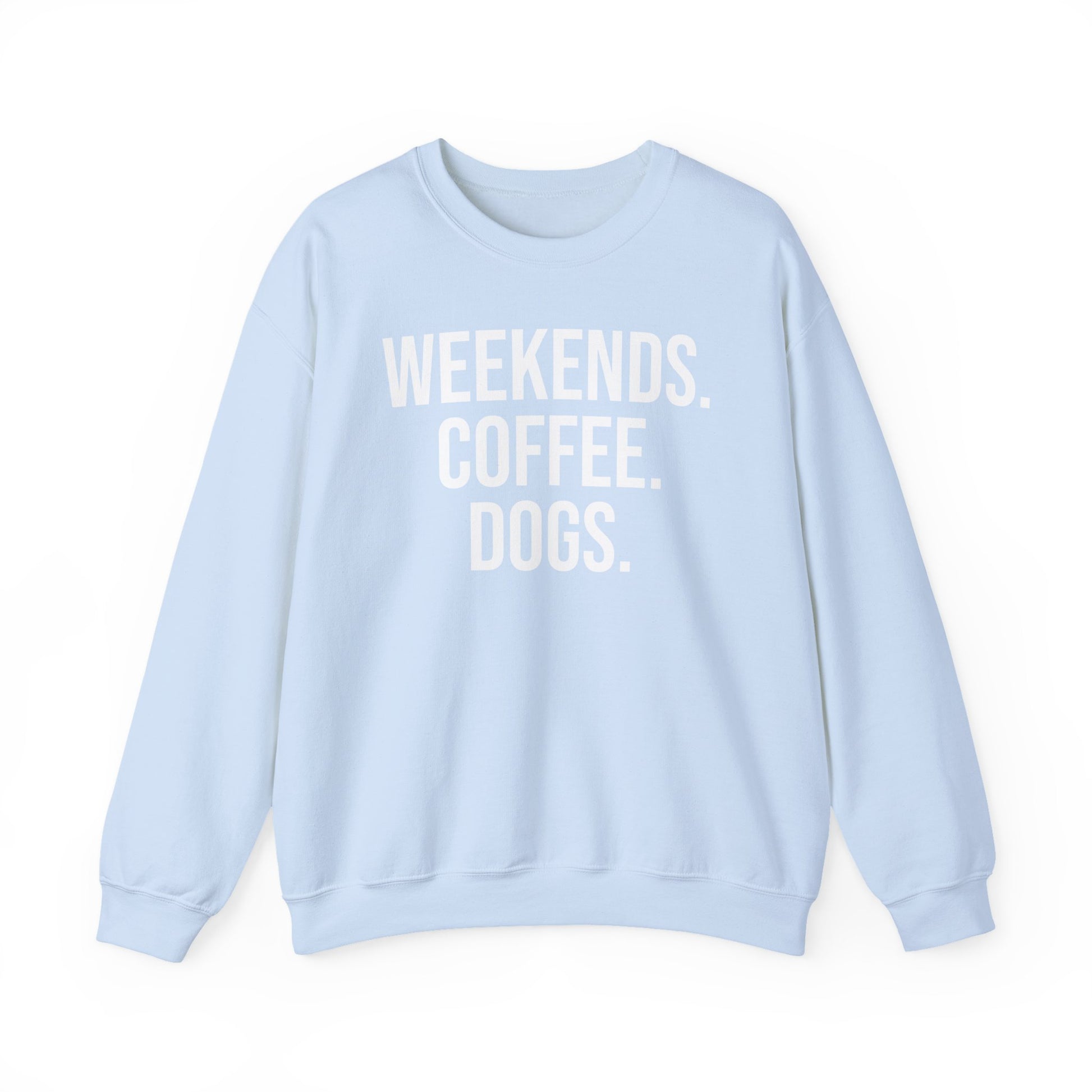 Light blue sweatshirt with 'WEEKENDS. COFFEE. DOGS.' white text on a white background.