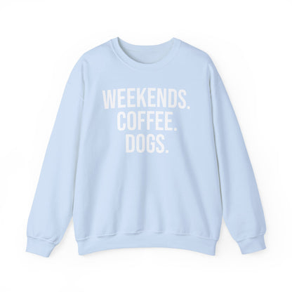 Light blue sweatshirt with 'WEEKENDS. COFFEE. DOGS.' white text on a white background.