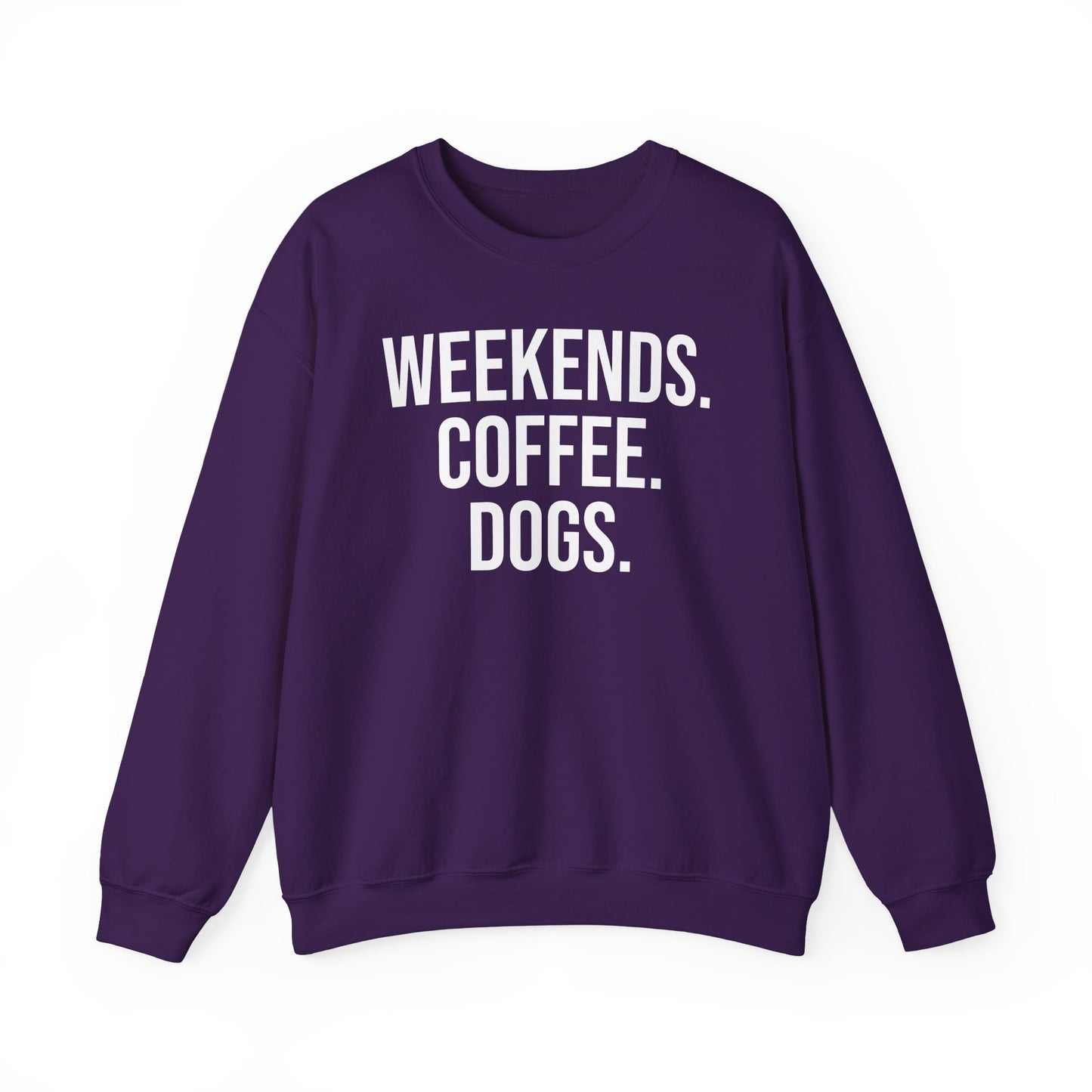 Purple sweatshirt with 'WEEKENDS. COFFEE. DOGS.' white text on a white background.