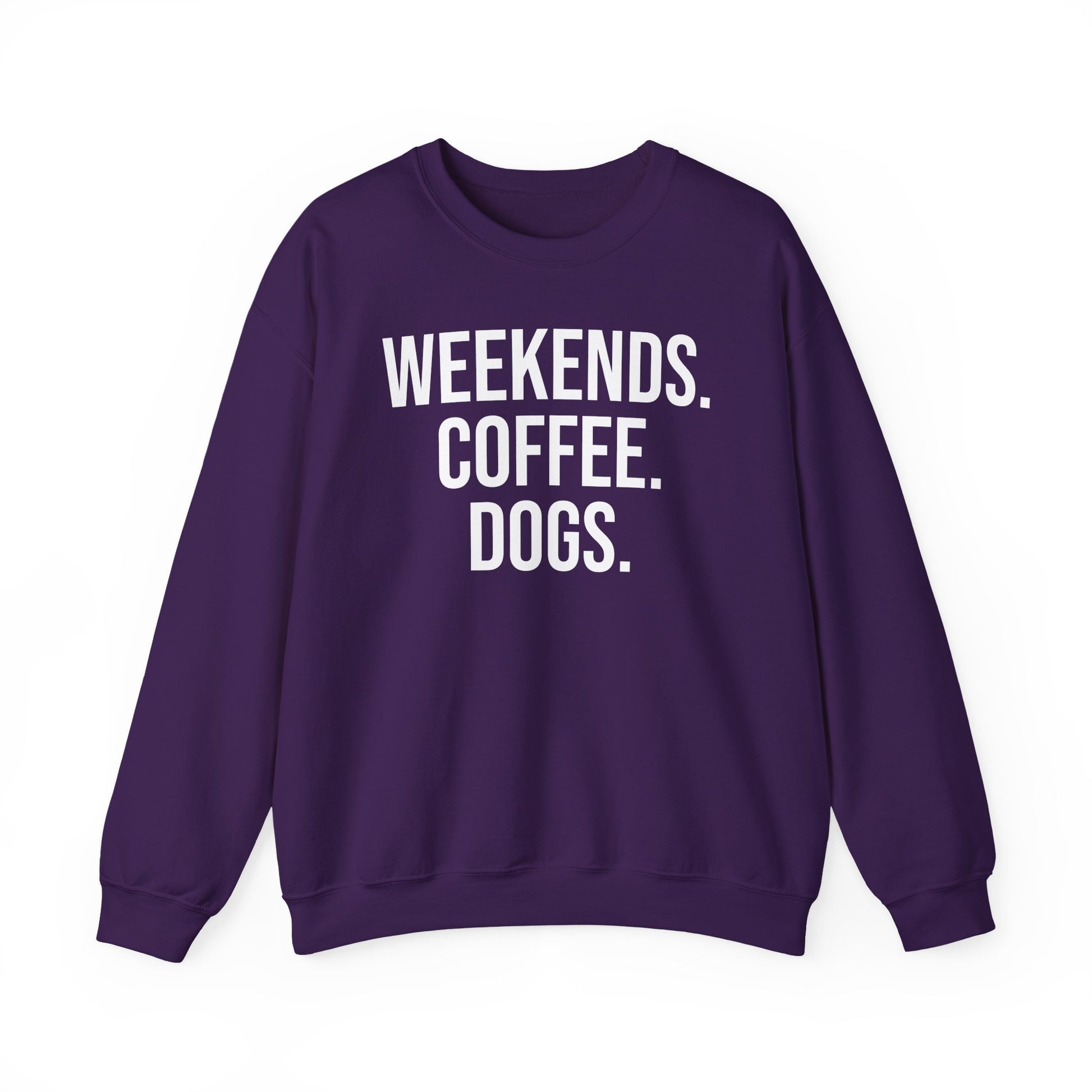 Purple sweatshirt with 'WEEKENDS. COFFEE. DOGS.' white text on a white background.