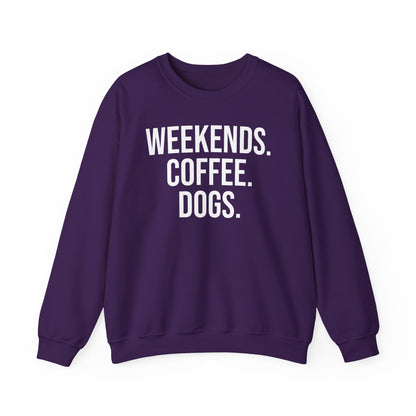Purple sweatshirt with 'WEEKENDS. COFFEE. DOGS.' white text on a white background.