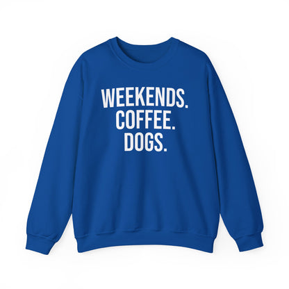 Royal blue sweatshirt with 'WEEKENDS. COFFEE. DOGS.' white text on a white background.
