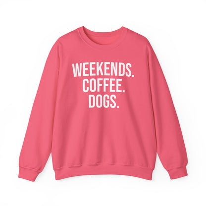 Safety pink sweatshirt with 'WEEKENDS. COFFEE. DOGS.' white text on a white background.