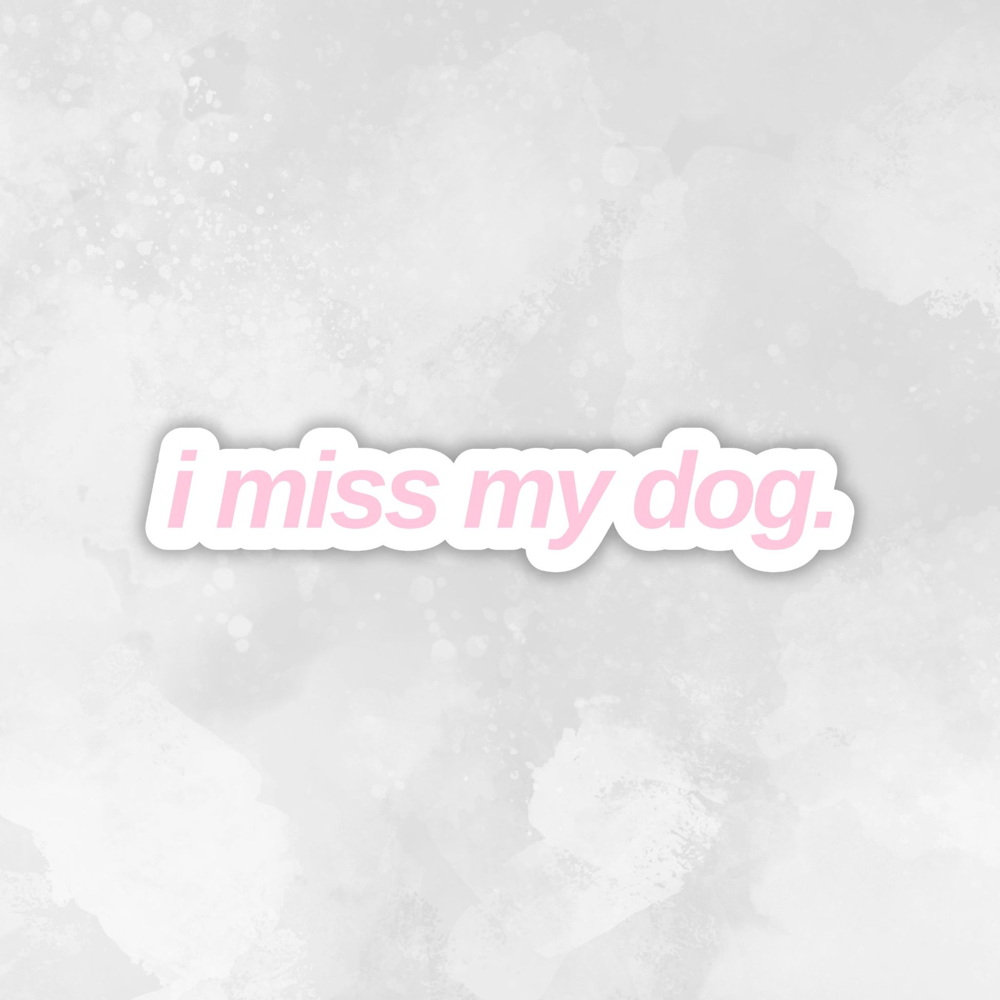Text 'i miss my dog.' in a light blue font on a light pink textured background