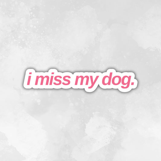 Text 'i miss my dog.' in a pink font on a light gray textured background